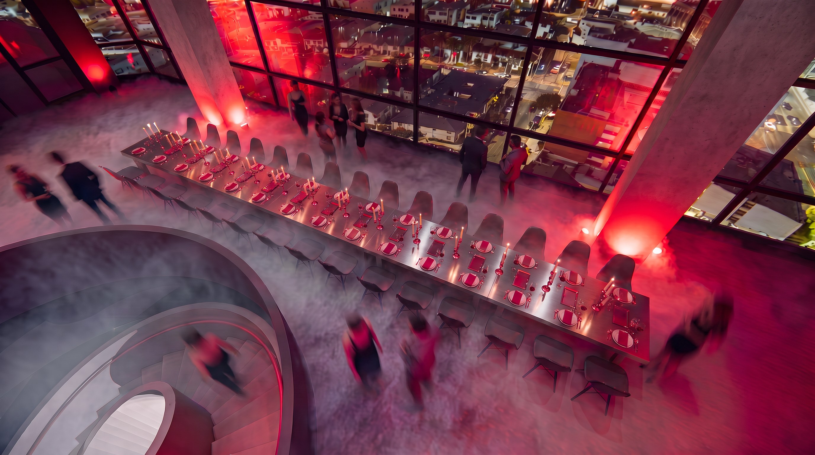 Long dinner table in red light above a projected cityscape