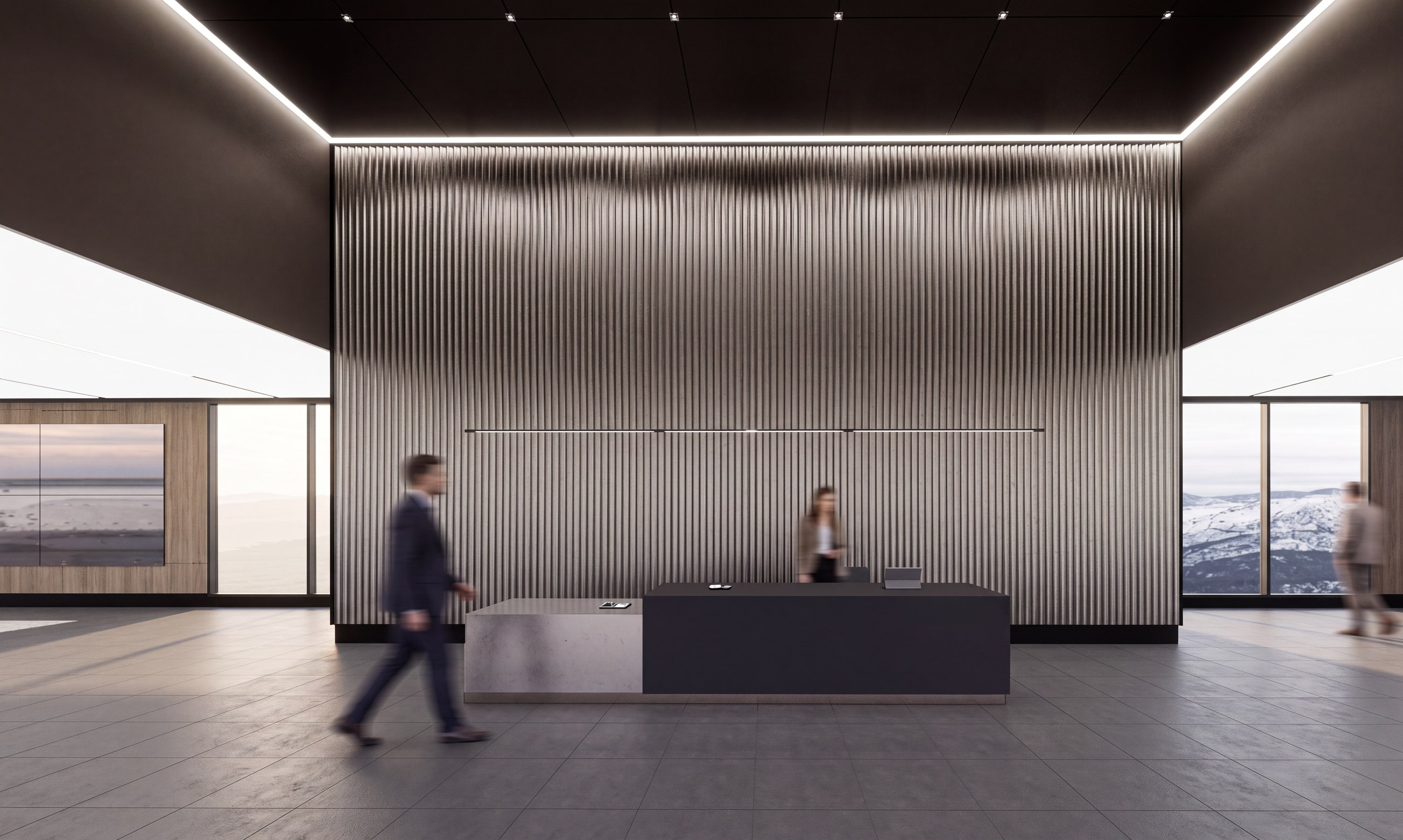 Reception before a fluted metal wall, mountains beyond
