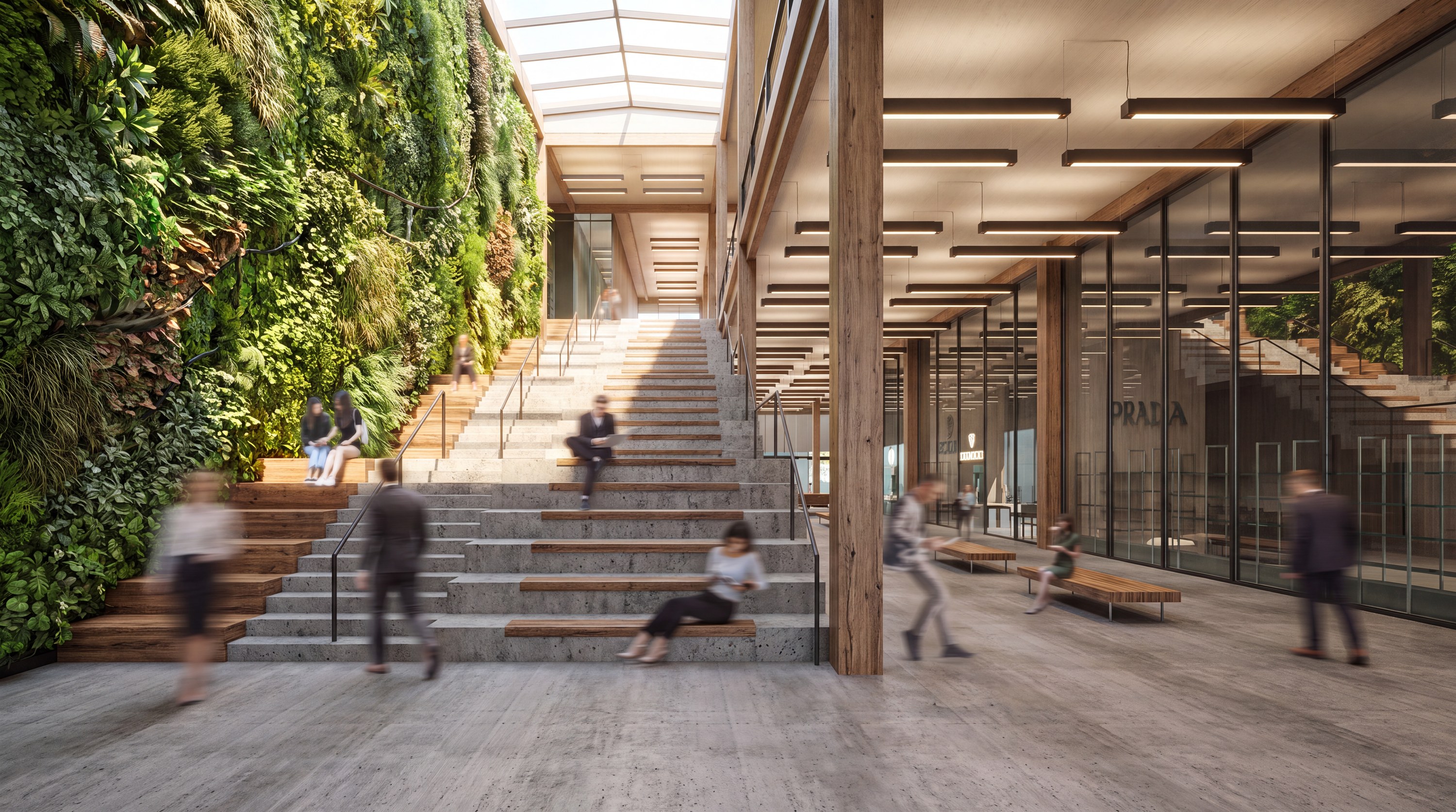 Atrium lobby with living green wall, grand social stair, and timber columns
